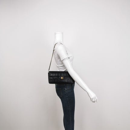 Sold Chanel East West Chocolate Bar Black Leather