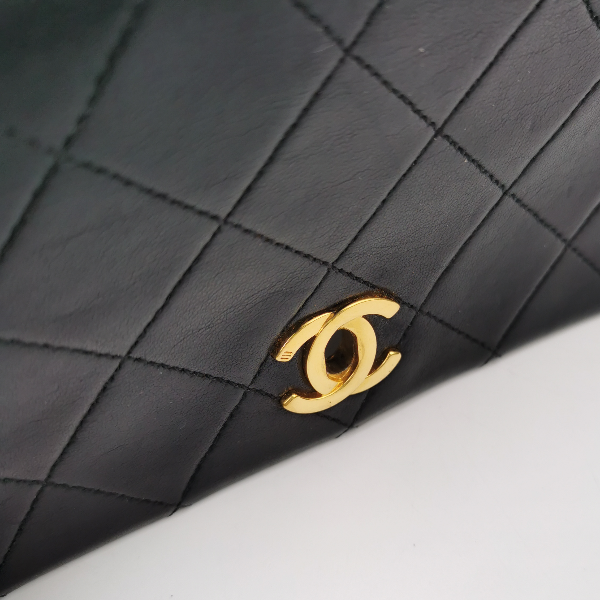 Sold Chanel Classic Flap Mini Vintage 1989-1991 Black Lambskin Leather with 24k Gold Hardware