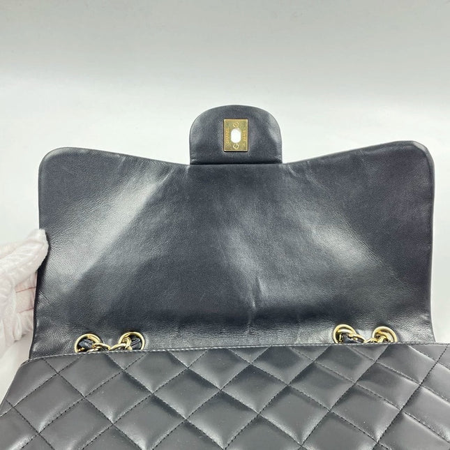 Sold Chanel Timeless/ Classic Flap Jumbo/Large Black with Gold Hardware