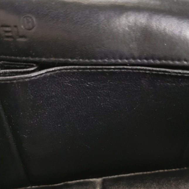 Sold Chanel East West Chocolate Bar Black Leather