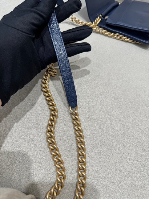 Sold Chanel Wallet on Chain WOC Boy Navy Caviar Leather with Antiqued Gold Hardware