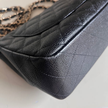 Sold Chanel Classic Flap 2009 Jumbo Black Caviar Leather Single Flap with Gold Hardware