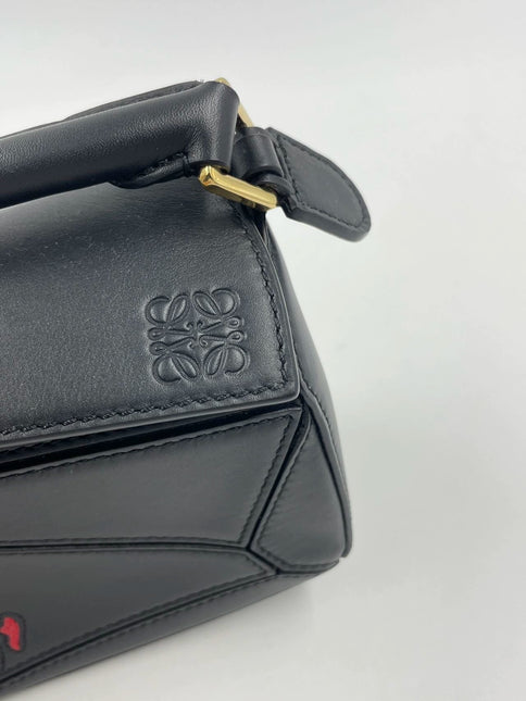 Sold Loewe x Howl's Moving Castle Studio Ghibli Collection Puzzle Calcifer Mini Black Crossbody Bag