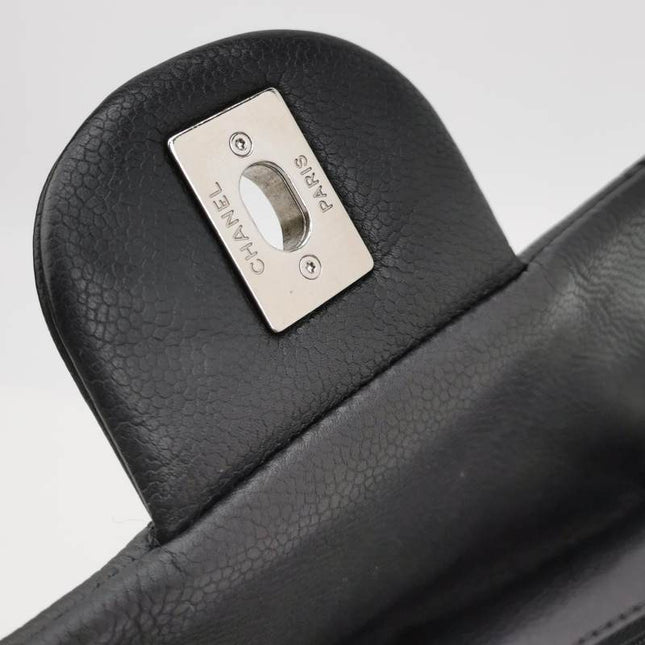 Chanel Classic Flap Maxi Black Soft Caviar Leather Silver-tone Hardware Giant CC Logo