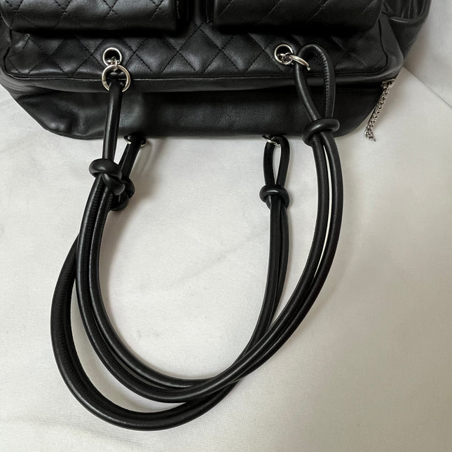 Chanel Cambon Multi-pocket Ligne Reporter Bag Large Black Calfskin Leather White Logo