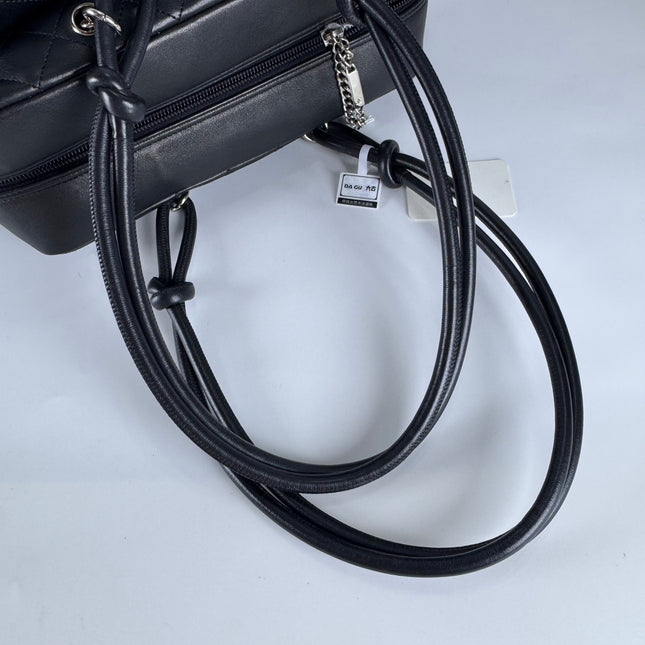 Sac Reporter Ligne Cambon Chanel en cuir de veau noir multipoches taille moyenne