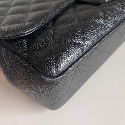 Sold Chanel Classic Flap 2009 Jumbo Black Caviar Leather Single Flap with Gold Hardware