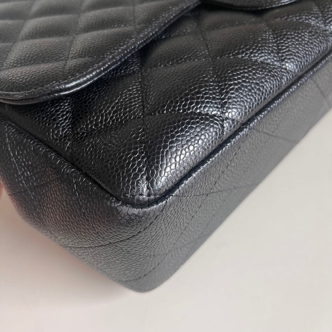 Sold Chanel Classic Flap 2009 Jumbo Black Caviar Leather Single Flap with Gold Hardware
