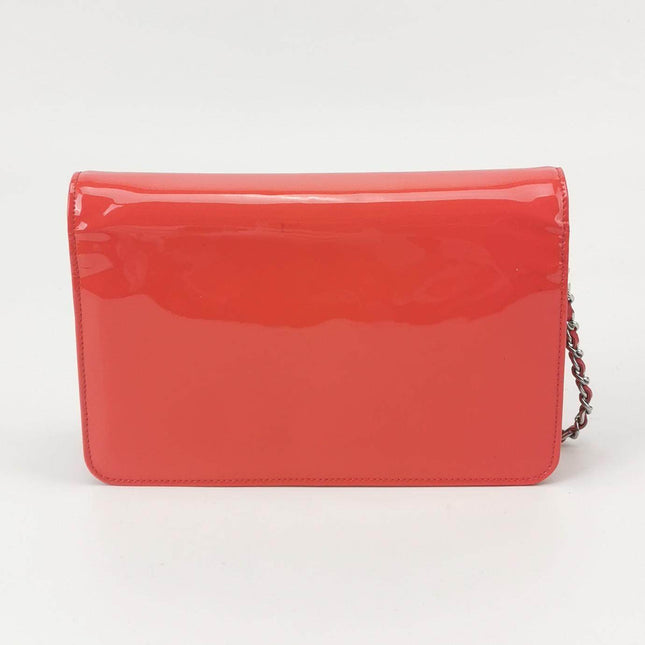 Sold Chanel Wallet on Chain Classic Flap Coral Pink Patent Leather