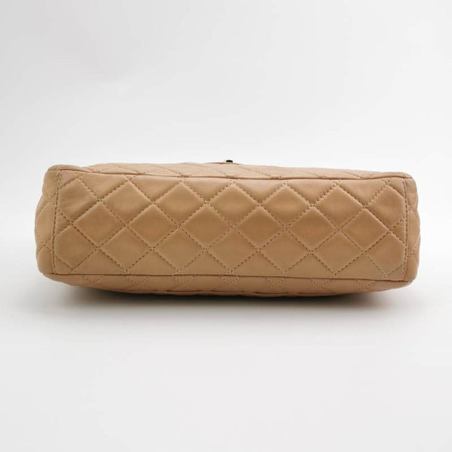Chanel Classic Flap Maxi Beige Latte Lambskin Leather Giant Gold-tone CC Logo