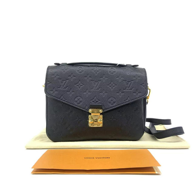 Sold Louis Vuitton Pochette Métis Monogram Empreinte Leather Black