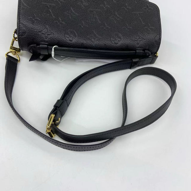 Sold Louis Vuitton Pochette Métis Monogram Empreinte Leather Black