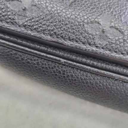 Sold Louis Vuitton Pochette Métis Monogram Empreinte Leather Black