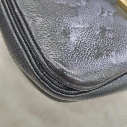 Sold Louis Vuitton Pochette Métis Monogram Empreinte Leather Black