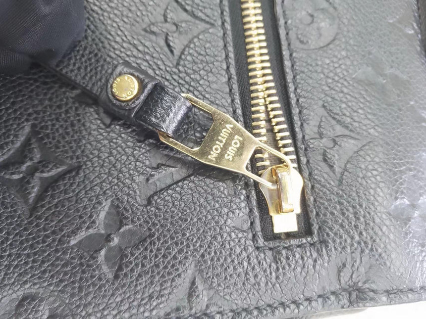 Sold Louis Vuitton Pochette Métis Monogram Empreinte Leather Black