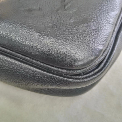 Sold Louis Vuitton Pochette Métis Monogram Empreinte Leather Black