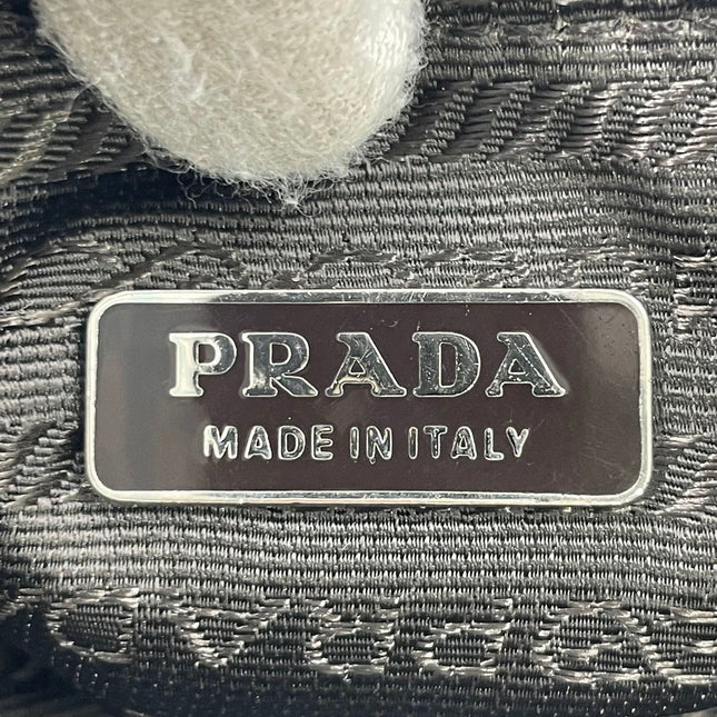 Prada Leopard Print Pony-style Calfskin Mini Clutch