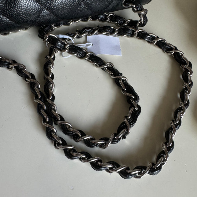 Sold Chanel Classic Flap Jumbo Black Caviar Leather Double Flap with Silver Hardware, 2014