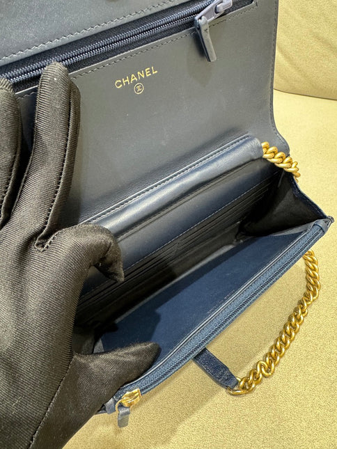 Sold Chanel Wallet on Chain WOC Boy Navy Caviar Leather with Antiqued Gold Hardware