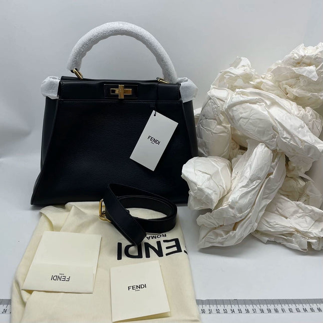 Sold Fendi Peekaboo Medium Black Leather Never worn