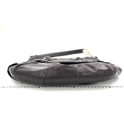 Sac à main Dior Corset en cuir noir et dentelle, avec ferrures argentées