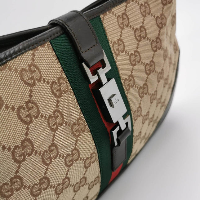 Sold Gucci Jackie Vintage Medium Monogram Canvas Black Leather Shoulder Bag