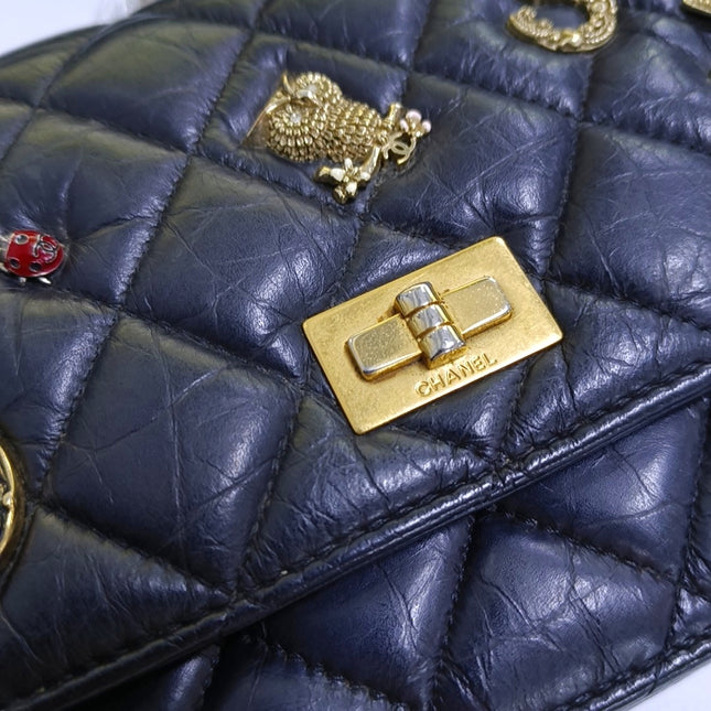 Chanel 2.55 Wallet on Chain Quilted Black Calfskin Leather Beatles Charms Gold Hardware