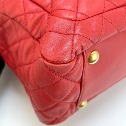 Sac cabas Chanel Grand Shopping Tote en cuir caviar bordeaux, taille GM, finitions argentées