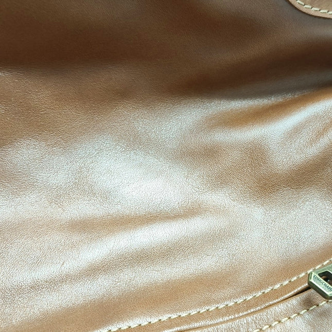 Sac de voyage Longchamp Au Sultan en cuir marron avec poignée et bandoulière en toile