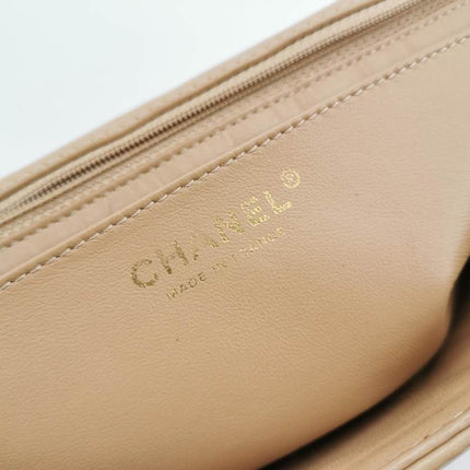 Chanel Classic Flap Maxi Beige Latte Lambskin Leather Giant Gold-tone CC Logo