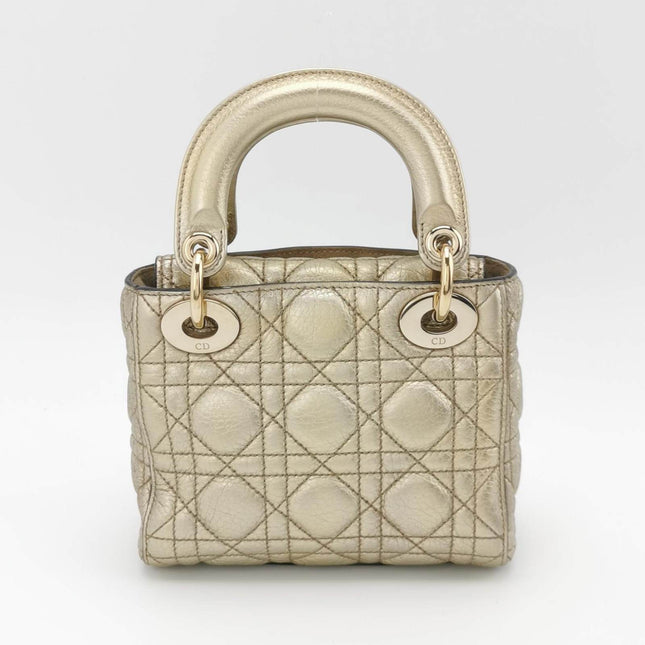 Sold Lady Dior Mini Supple Calfskin Leather Gold Cannage Handbag with Strap