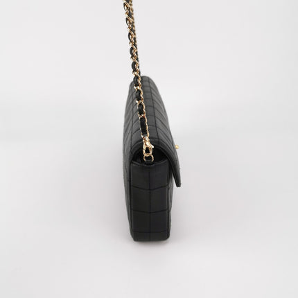 Sold Chanel East West Chocolate Bar Black Leather