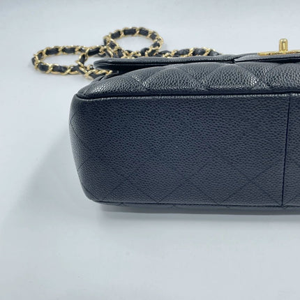 Sold Chanel Classic Flap 2009 Jumbo Black Caviar Leather Single Flap with Gold Hardware