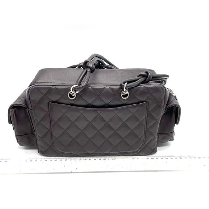 Sac Reporter Ligne Cambon Chanel en cuir de veau noir multipoches taille moyenne