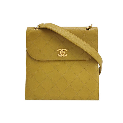 Sac à rabat Chanel Vintage Kelly en cuir caviar jaune et finitions dorées 24 carats 1997-1999