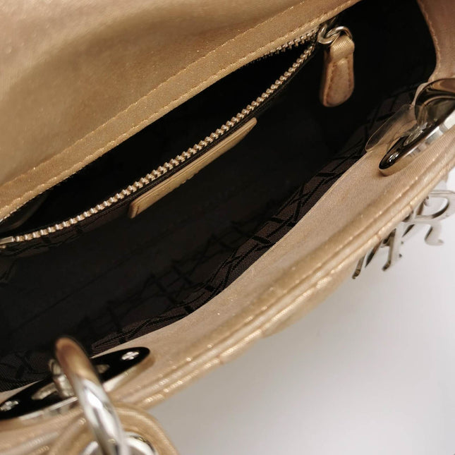 Sold Lady Dior Mini Gold Textile Cannage handbag with strap