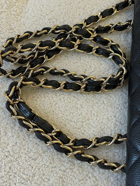 Sold Chanel Classic Flap Jumbo/Large Black Caviar Leather with Gold Hardware