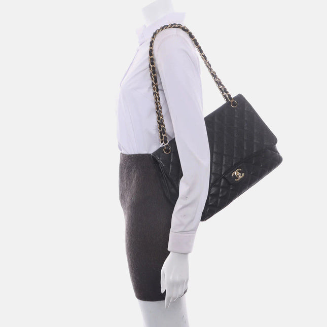 Sold Chanel Classic Flap Maxi 2009 Black Caviar Leather Single Flap with Gold Hardware
