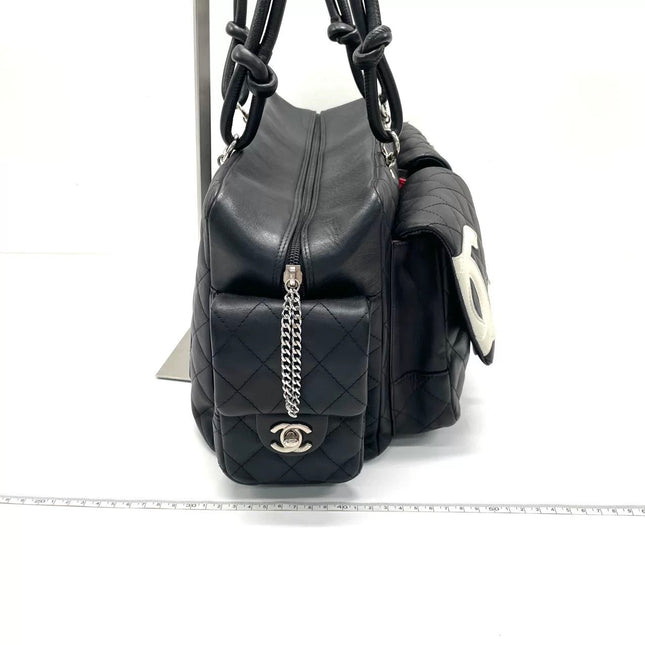Chanel Cambon Multi-pocket Ligne Reporter Bag Large Black Calfskin Leather White Logo