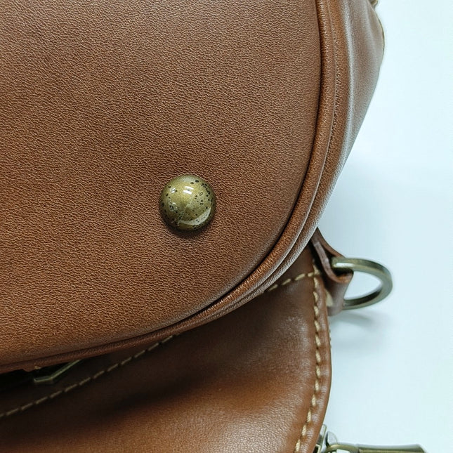 Sac de voyage Longchamp Au Sultan en cuir marron avec poignée et bandoulière en toile