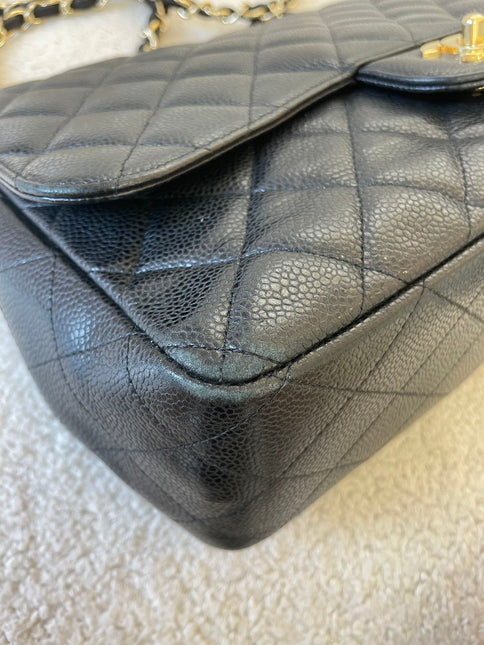 Sold Chanel Classic Flap Jumbo/Large Black Caviar Leather with Gold Hardware