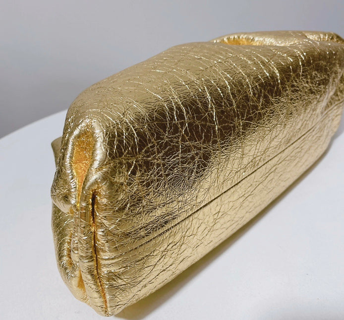 Sold Bottega Veneta Pouch Gold Leather