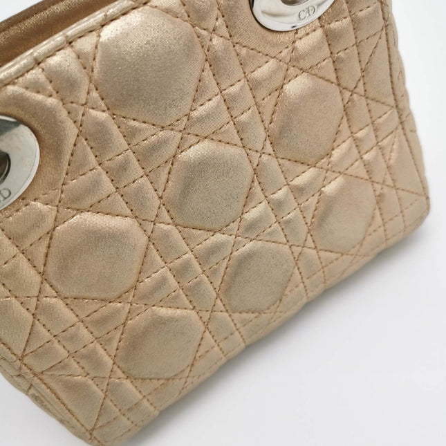 Sold Lady Dior Mini Gold Textile Cannage handbag with strap