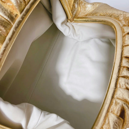 Sold Bottega Veneta Pouch Gold Leather