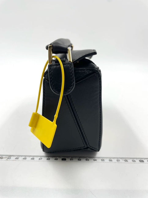 Sold Loewe x Howl's Moving Castle Studio Ghibli Collection Puzzle Calcifer Mini Black Crossbody Bag