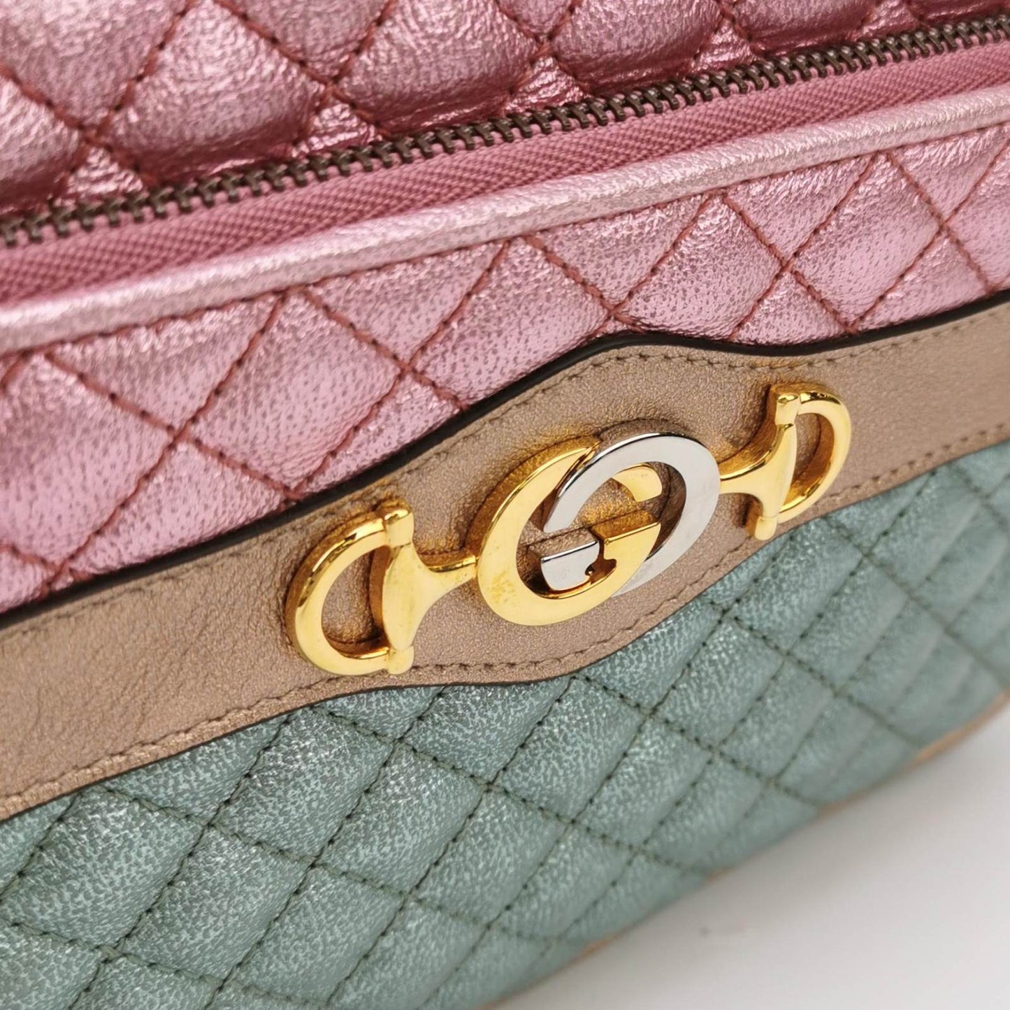 Sold Gucci Pink Teal Mini Metallic Laminated Trapuntata Leather Horsebit Clutch