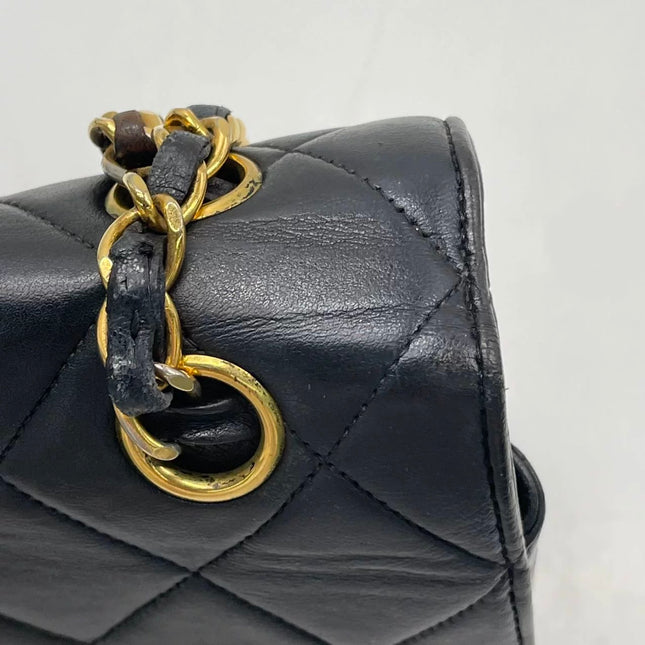 Chanel Jumbo Double Sided Classic Flap Black Lambskin Leather 24k Gold Hardware Handbag