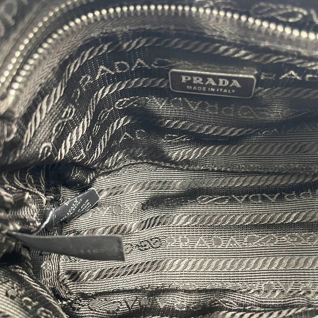 Prada Leopard Print Pony-style Calfskin Mini Clutch