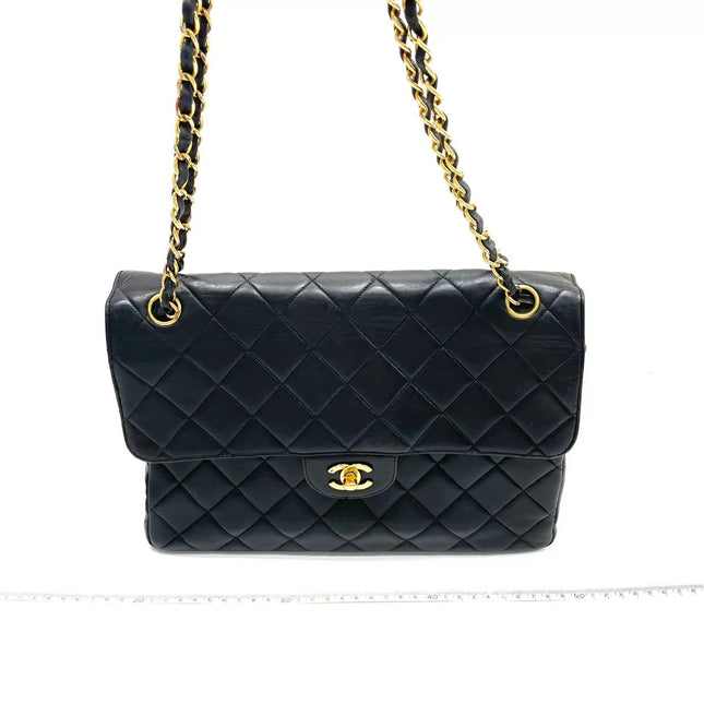 Chanel Jumbo Double Sided Classic Flap Black Lambskin Leather 24k Gold Hardware Handbag