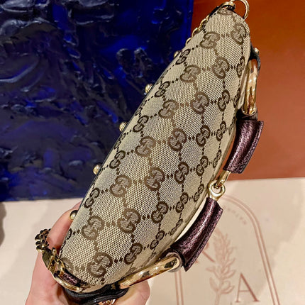 Sold Gucci Horsebit 1955 Chain Bag Gucci Monogram Iridescent Purple Leather and Gold Studs